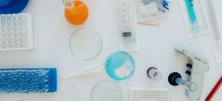 a table with scientific equipment where peptide structure is checked