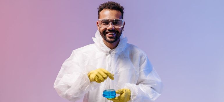 a scientist holding a test tube